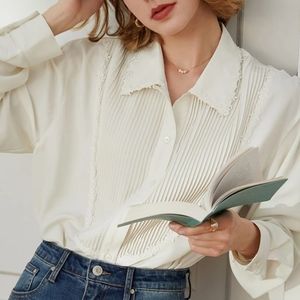 White oversized blouse